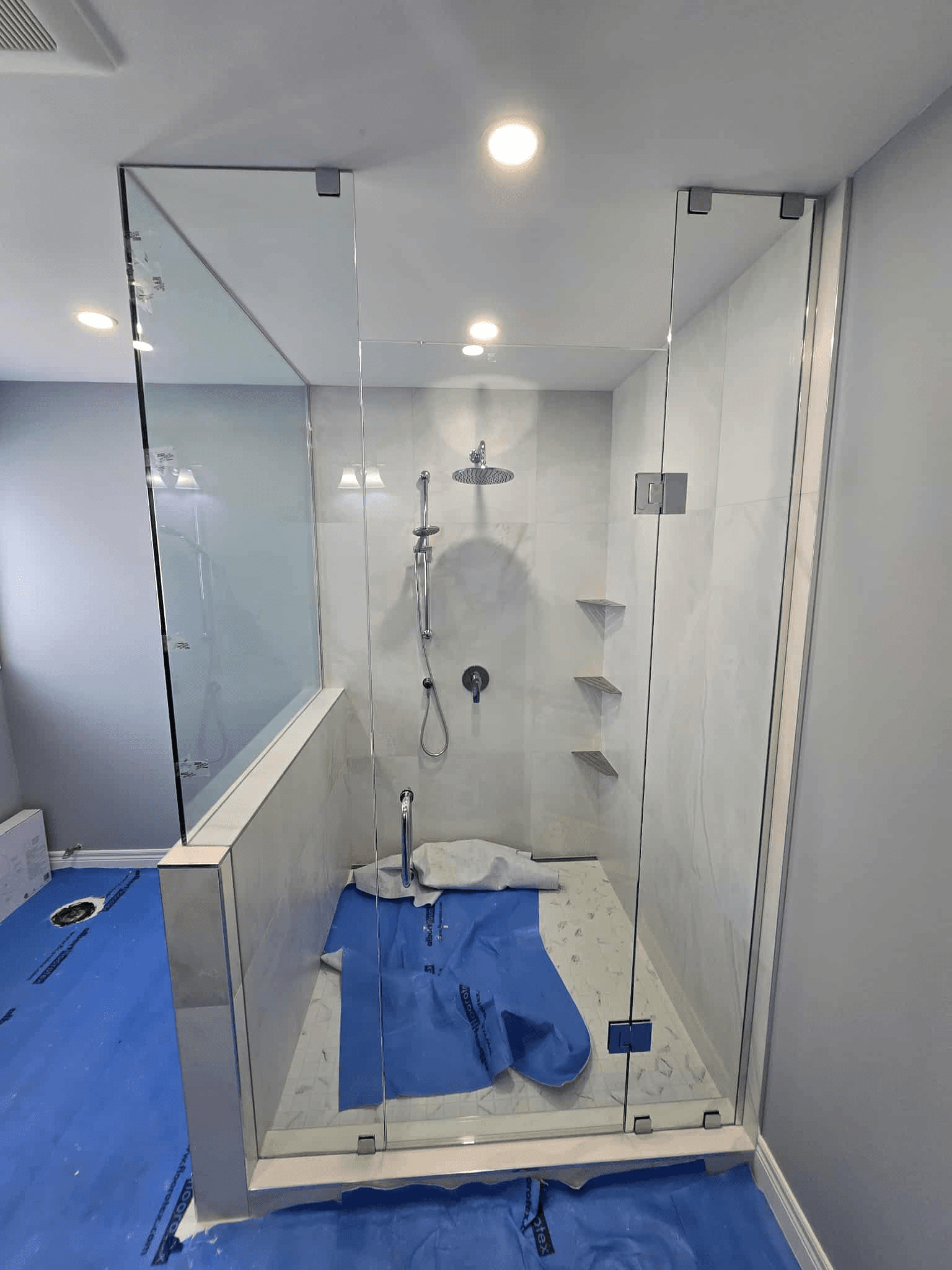 Frameless glass shower installed by Hammertown Glass & Mirror in Hamilton