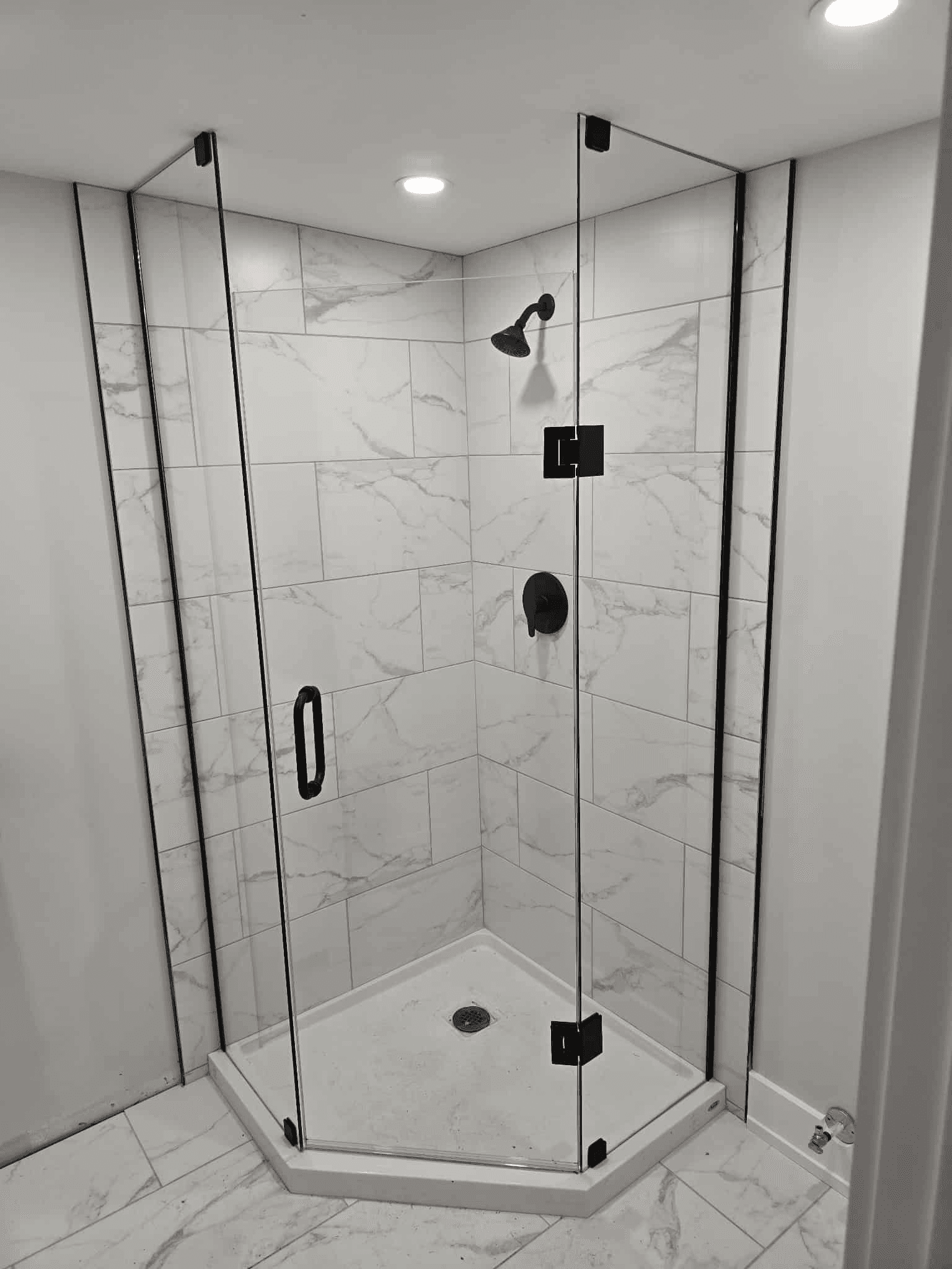 Glass shower panel installation in the Hamilton area